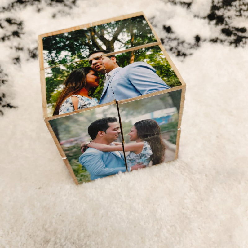 Hexagonal photo block with a couple in a park on a white surface