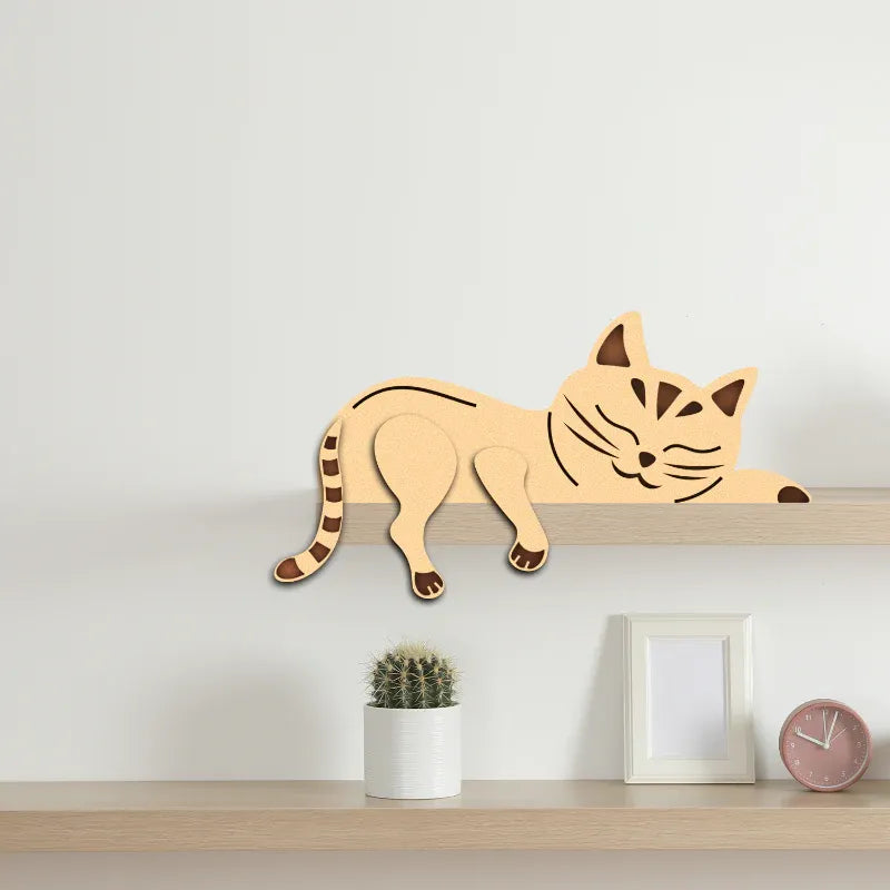 Wooden cat-shaped decoration on a shelf with a minimal background