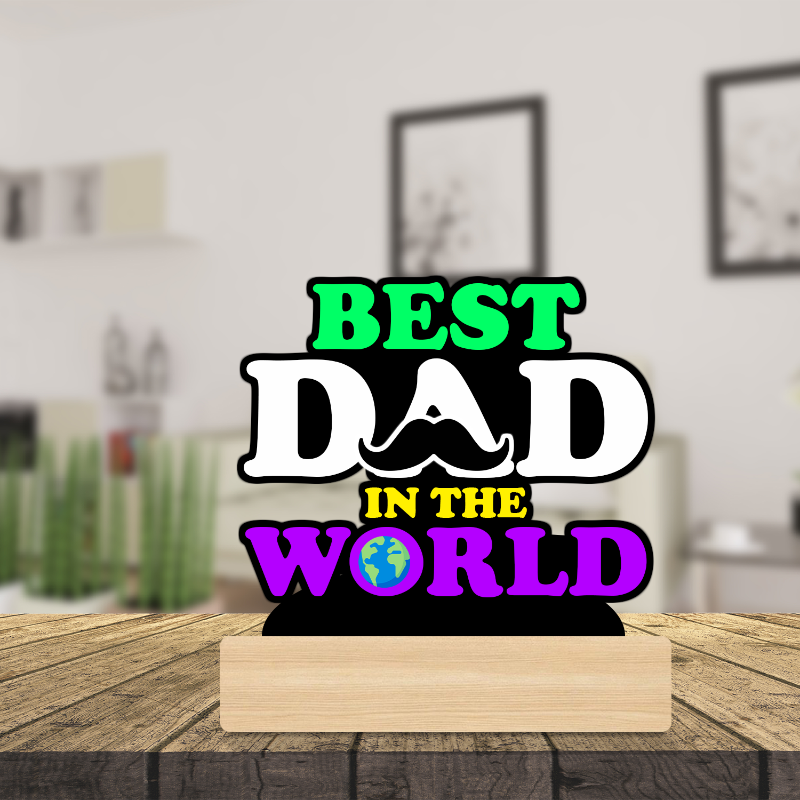 Decorative sign with 'Best Dad in the World' text on a wooden stand in a room setting.