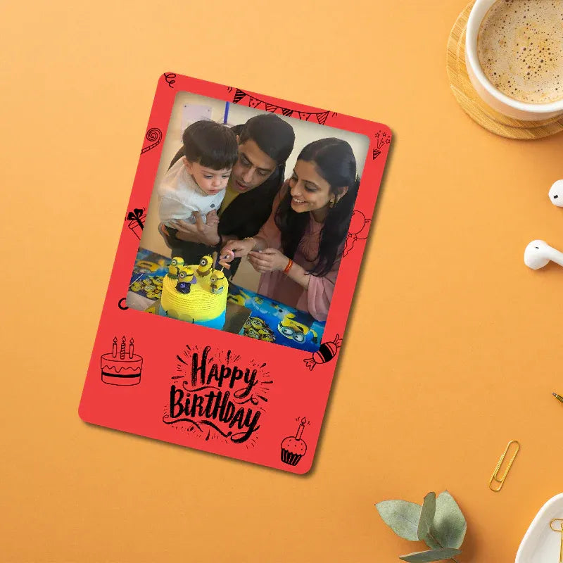 Personalized birthday magnet with a family photo and 'Happy Birthday' text on an orange background.