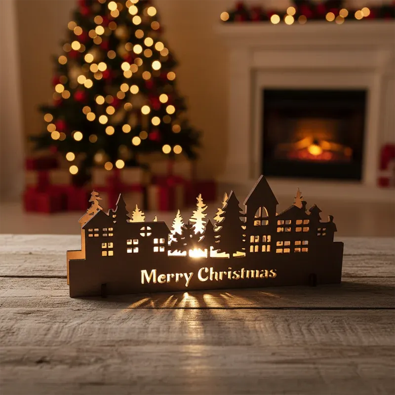 Decorative Christmas village scene with 'Merry Christmas' text, lit up on a wooden surface with a festive background.