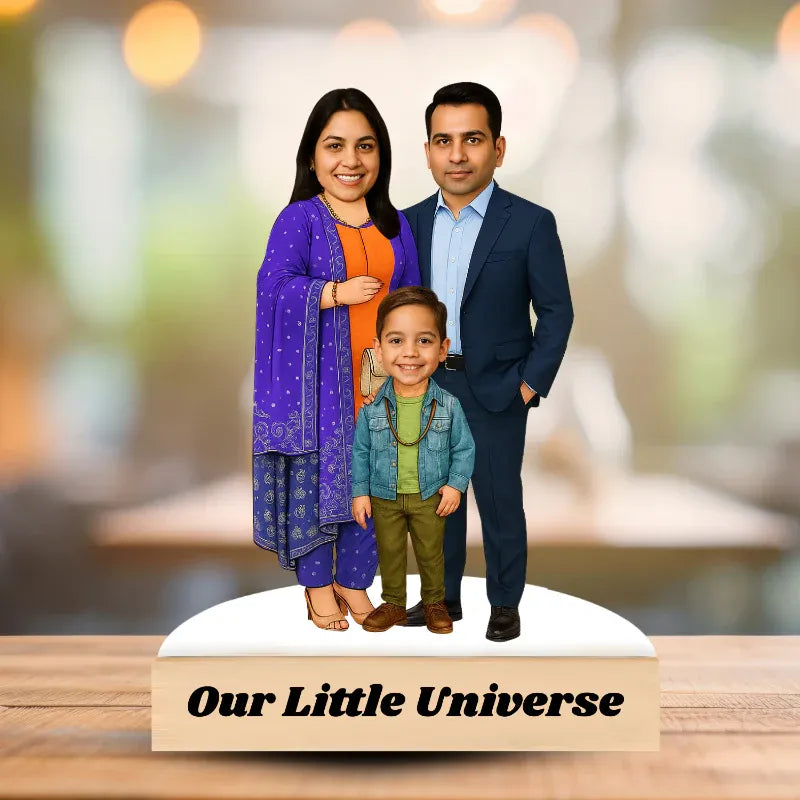 Family custom caricature set on a wooden base with 'Our Little Universe' text, against a blurred background.