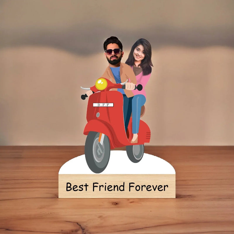 Figurine of a man and woman on a red scooter with 'Best Friend Forever' text on a wooden base.