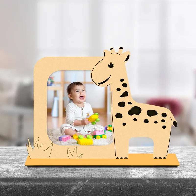 Wooden photo frame shaped like a giraffe with a child playing in the background