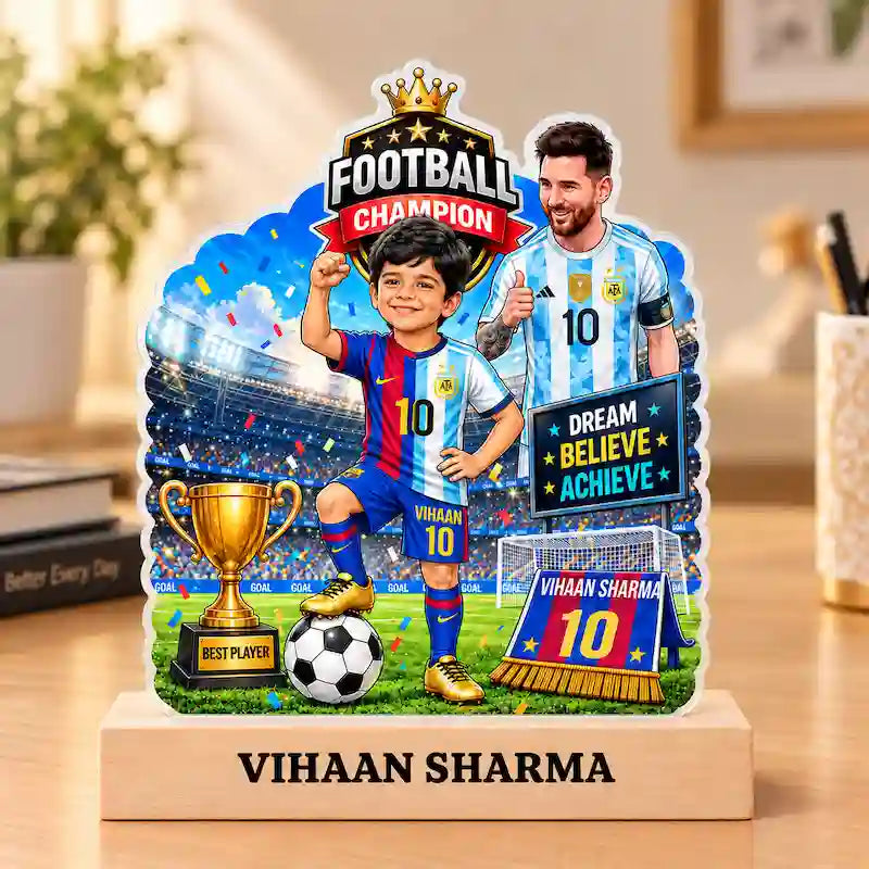 Custom kids football caricature standee gift of a young footballer displayed on a study desk with the child's name on the wooden base.