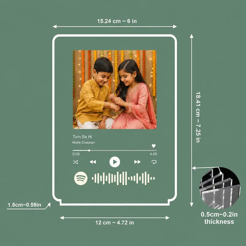 A digital product mockup showing a custom Spotify player framed picture frame with dimensions. The frame features a white border and a customizable screen displaying a video of a young boy and girl.