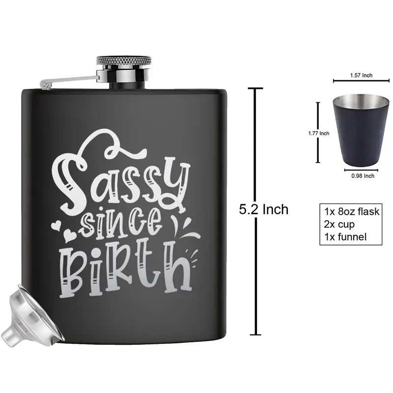 Black flask with 'Sassy since birth' text and measurements on a white background