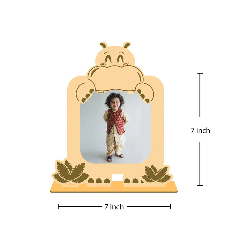 Hippo baby photo frame — personalised peach wooden hippo shaped frame with tropical leaf details custom baby photo and yellow wooden base, 7x7 inch unique newborn gift from Zingy Gifts India