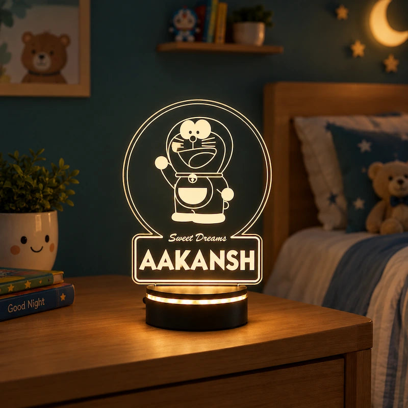 Customized Doraemon night lamp with name Aakansh glowing on a kids’ bedside table.