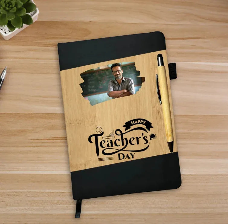 Notebook with 'Happy Teacher's Day' text and a photo of a person on a wooden surface.