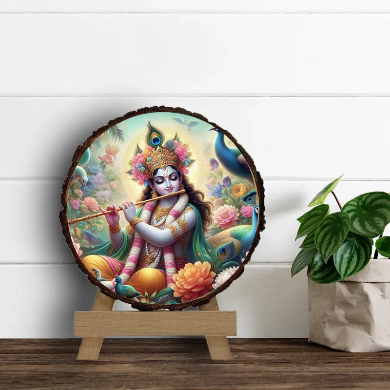 Decorative piece with a colorful depiction of a deity on a wooden stand, with a plant in the background.