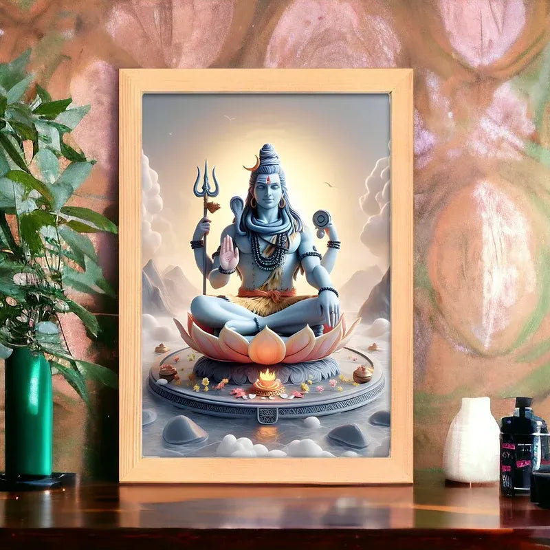 Framed artwork of a deity sitting on a lotus flower with a decorative background