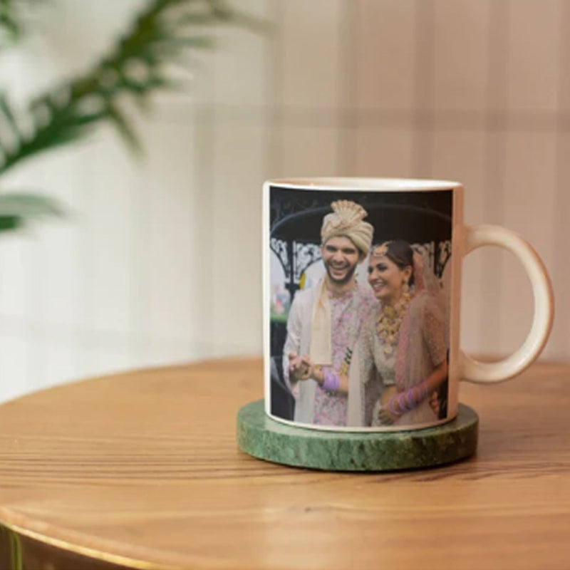 Mug with a printed photo of a couple on a wooden table