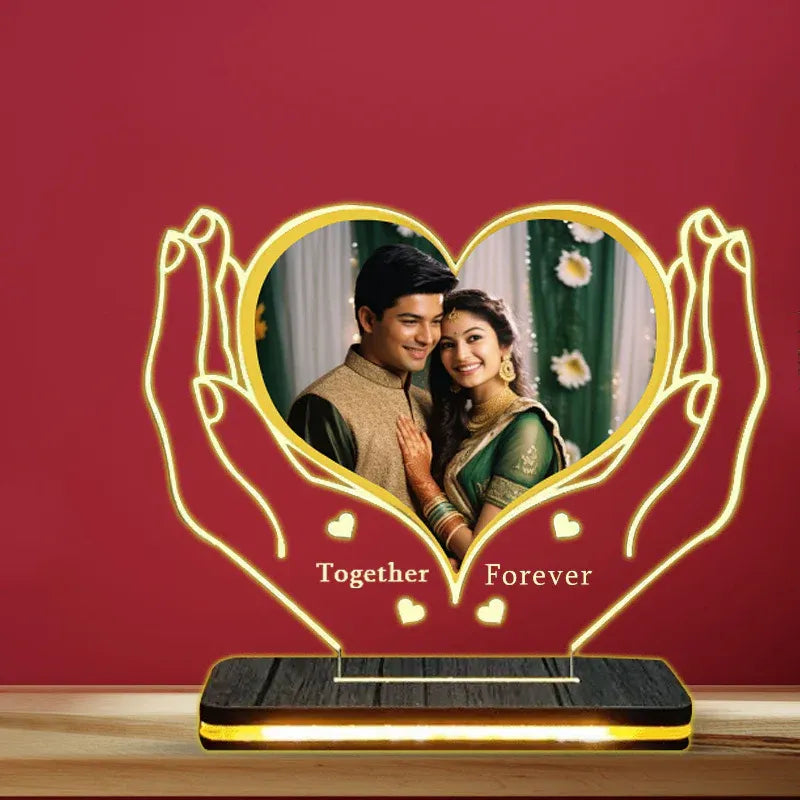 Heart-shaped photo frame with hands holding a couple and 'Together Forever' text on a red background.