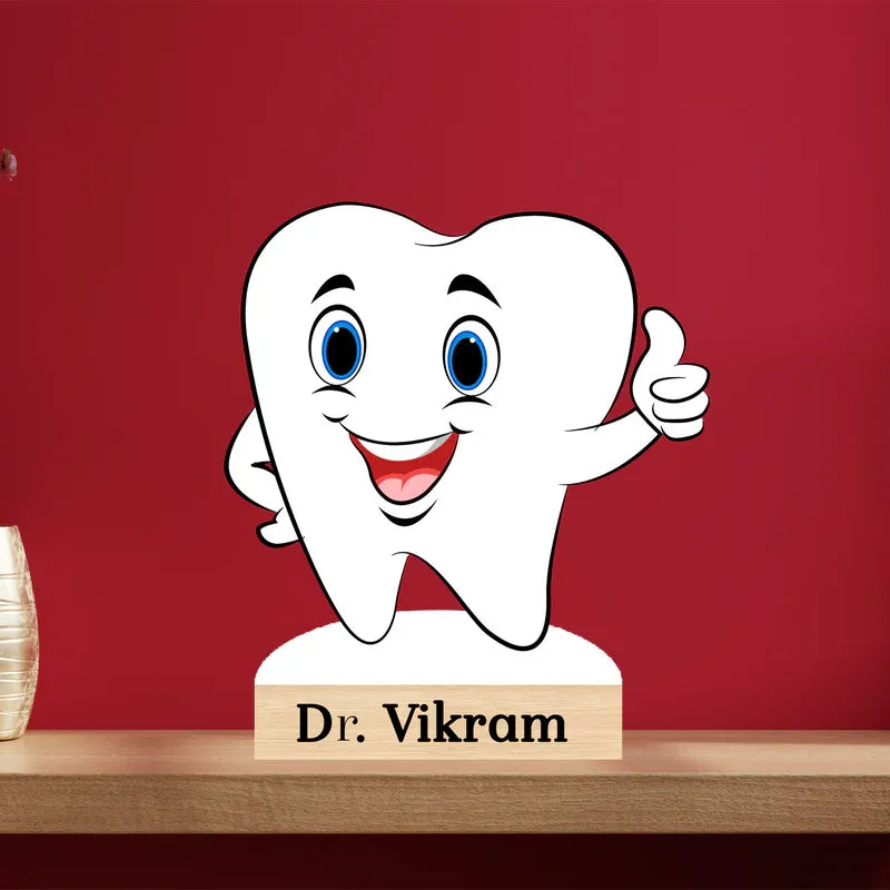 Cartoon tooth character with a red background and 'Dr. Vikram' sign