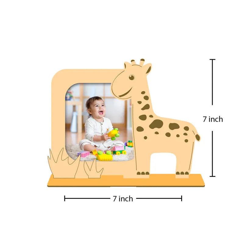 Giraffe-shaped photo frame with a child playing, showing dimensions on a white background.