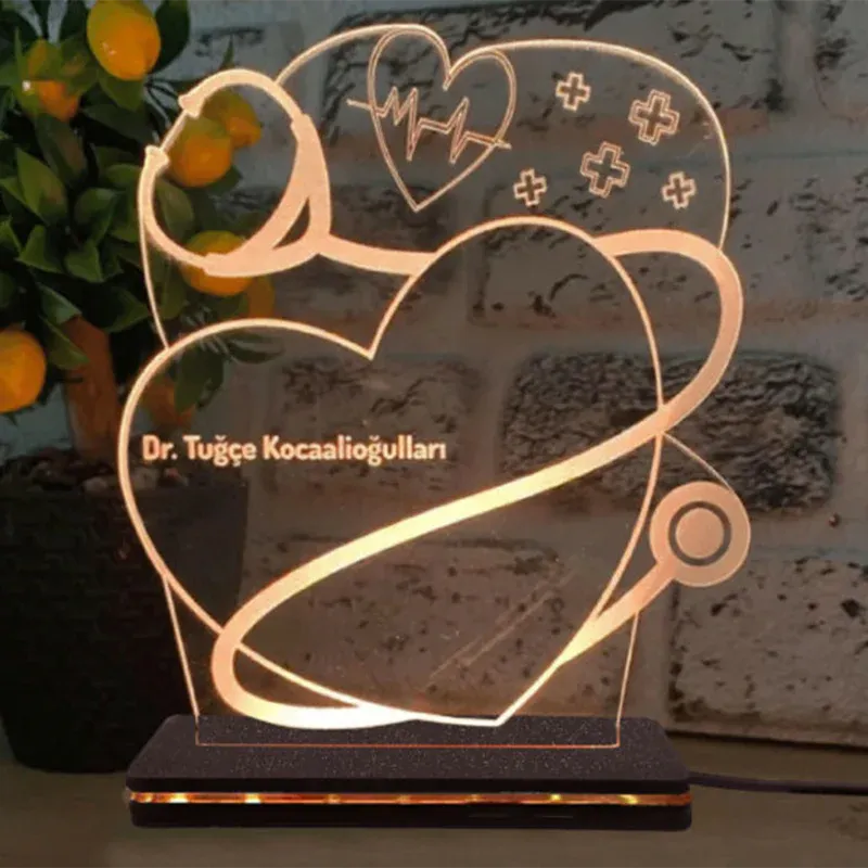 Decorative lamp with heart design and text on a blurred background