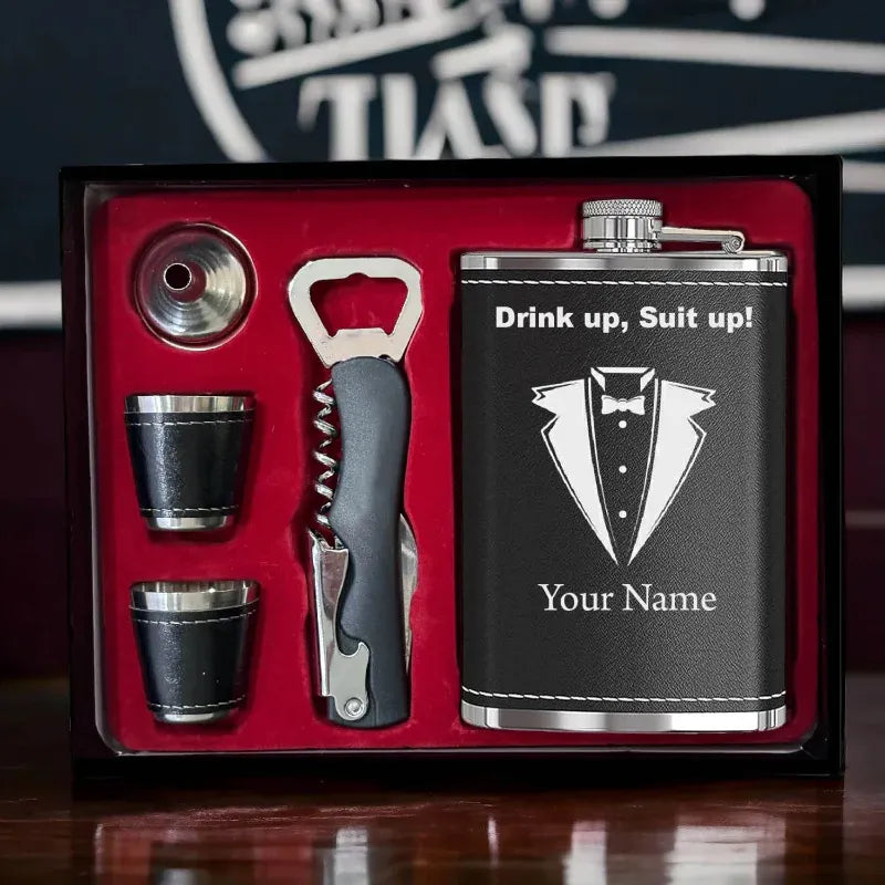 Alcohol flask set with personalized name on a red interior background