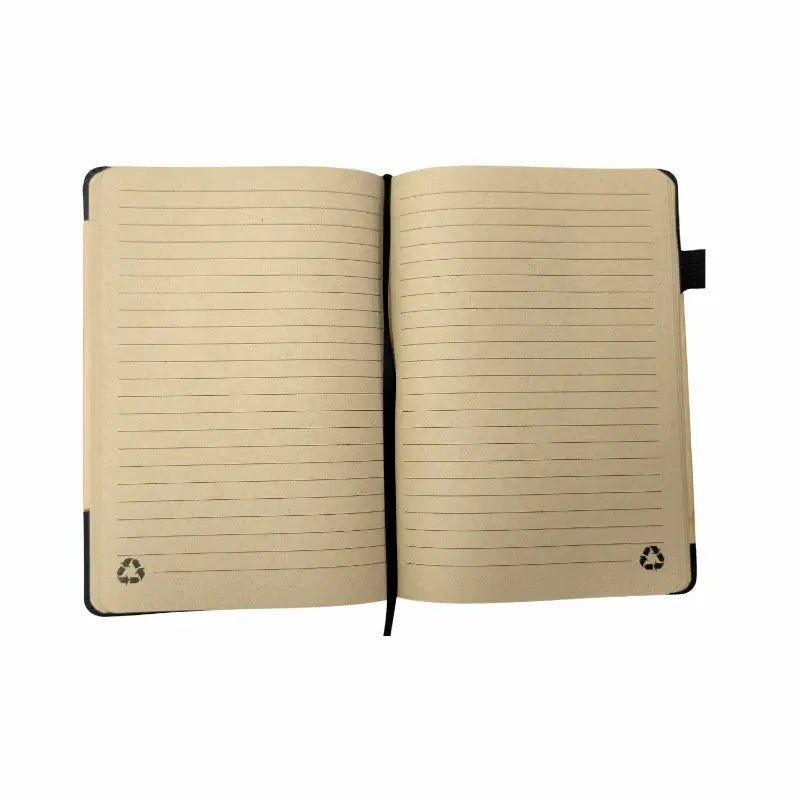 An open lined notebook with cream-colored pages, a black elastic closure, and a small black ribbon bookmark on the right side, shown against a plain white background.