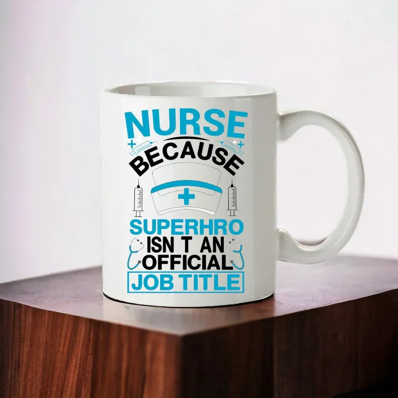 White mug with blue and black text on a wooden surface