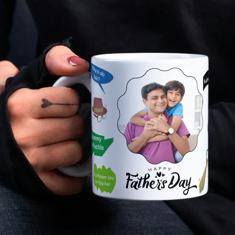Person holding a mug with a personalized design of a father and son, featuring 'Happy Father's Day' text.