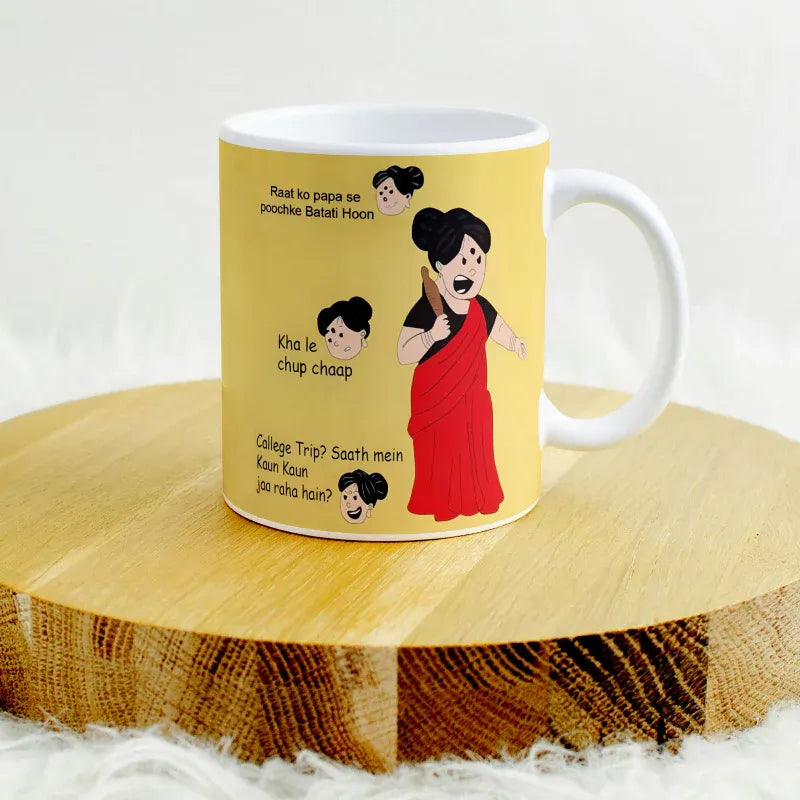 Mug with cartoon characters and text on a wooden stand