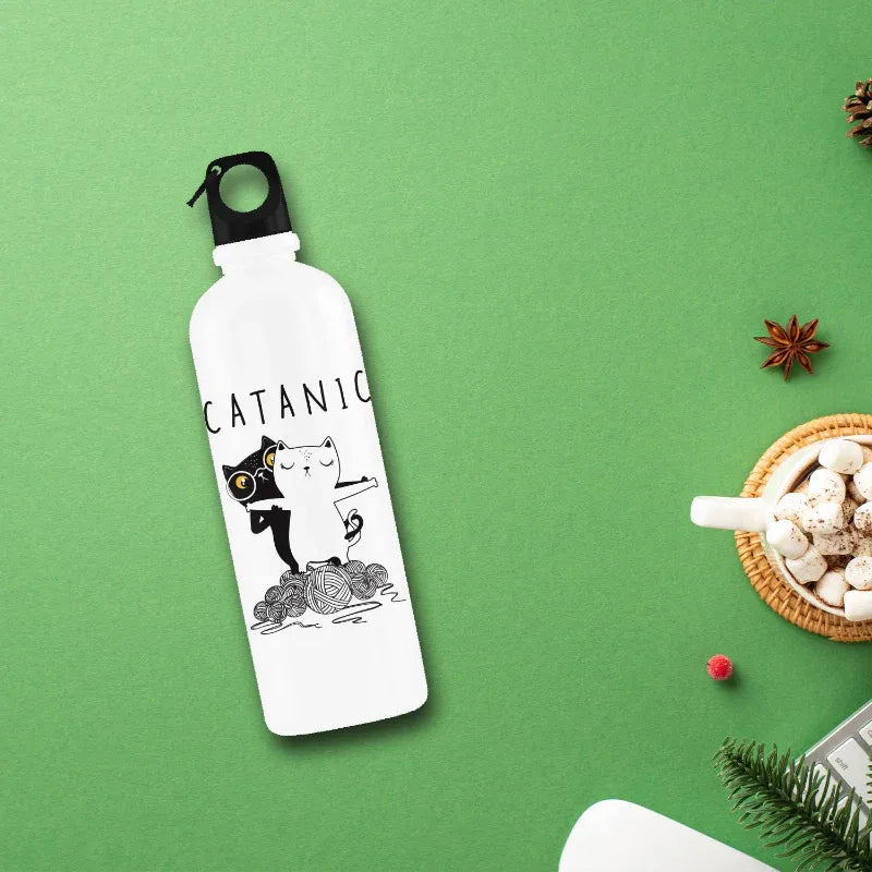 White water bottle with black cat illustration and 'CATANIC' text on a green background
