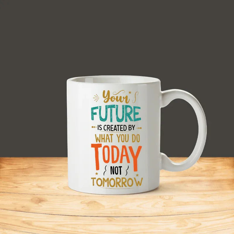 White mug with motivational quote on a wooden surface and dark background