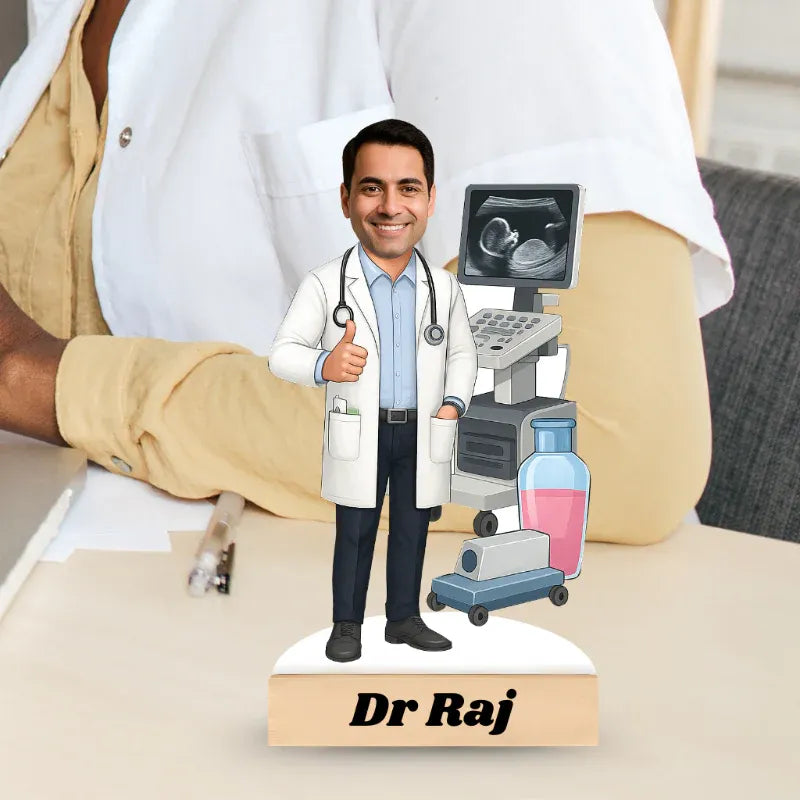 Doctor figurine named 'Dr Raj' with ultrasound machine in the background