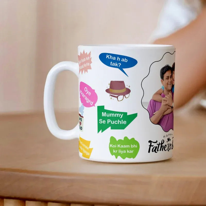 White mug with colorful text and images on a wooden surface