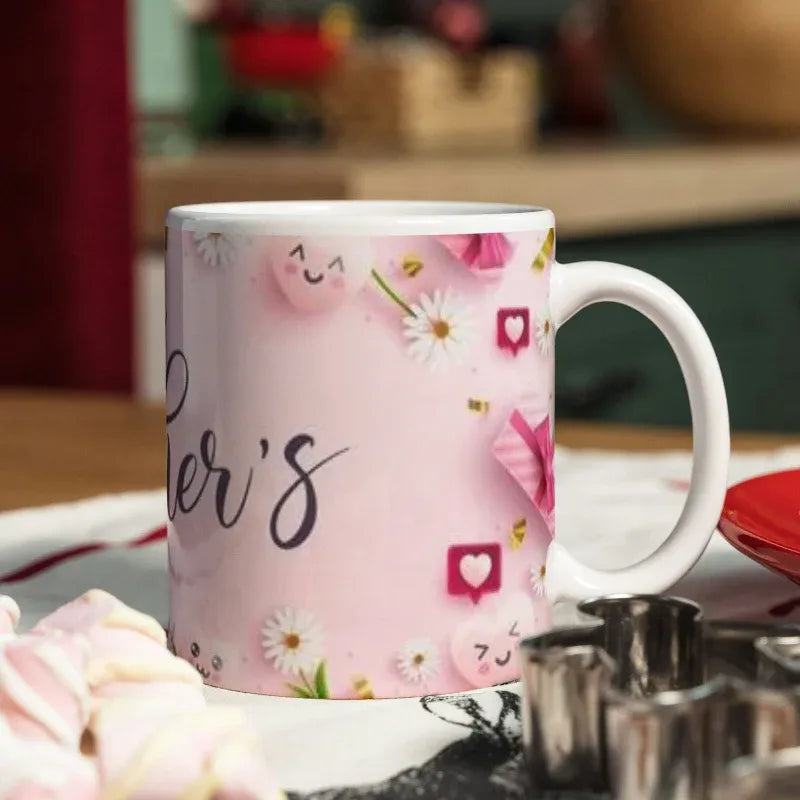 Pink mug with floral design and 'Mother's' text on a kitchen counter.