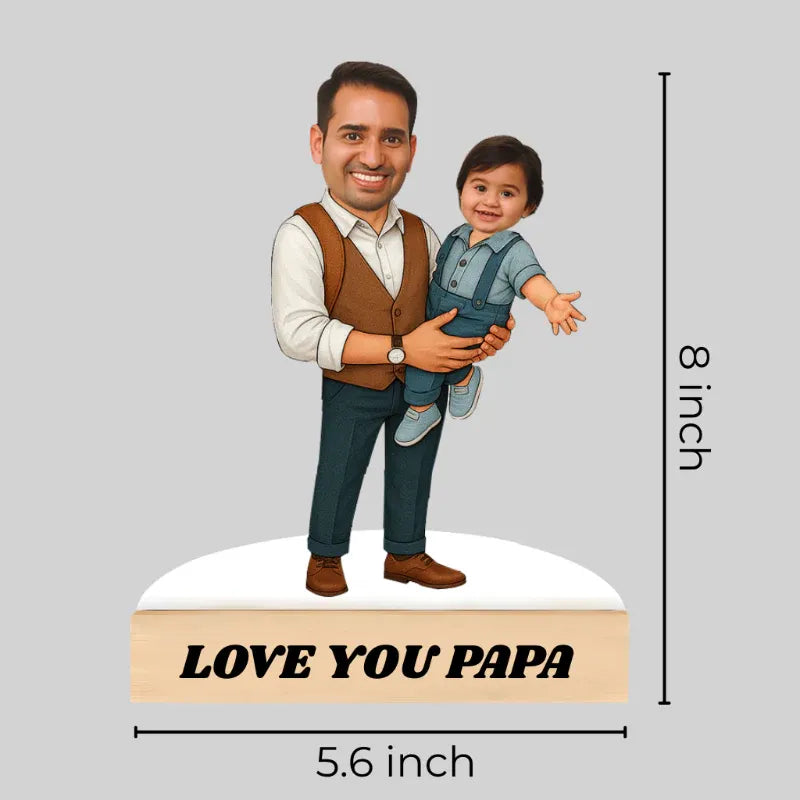 Figurine of a man holding a child with 'Love You Papa' text on a gray background