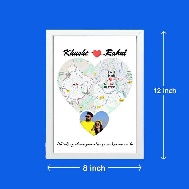 A personalized photo frame with a heart-shaped design, featuring a couple's photo, location maps, and a quote in Hindi script.