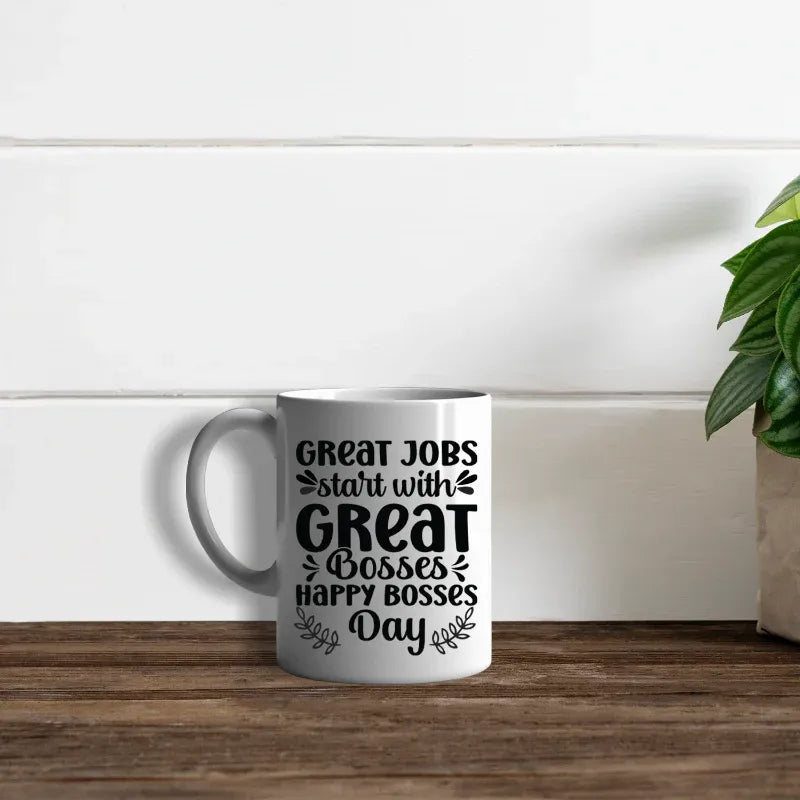 White mug with text on a wooden surface and white wall background