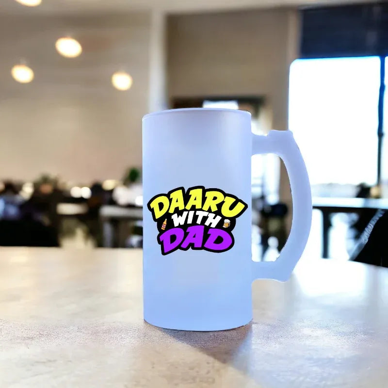 White mug with colorful text 'DAARU WITH DAD' on a blurred indoor background