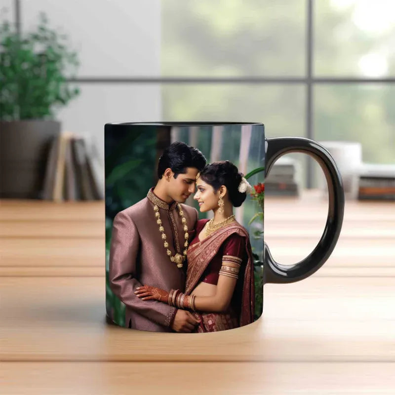 Black mug with a printed image of a couple on a wooden surface.