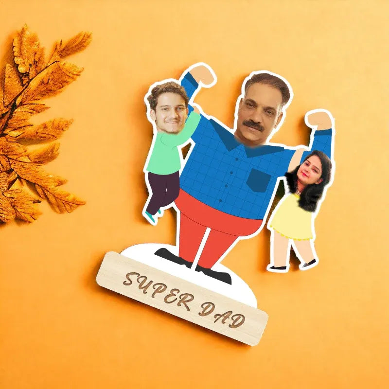 Cartoon cutout of a father with two children on an orange background with 'Super Dad' sign.