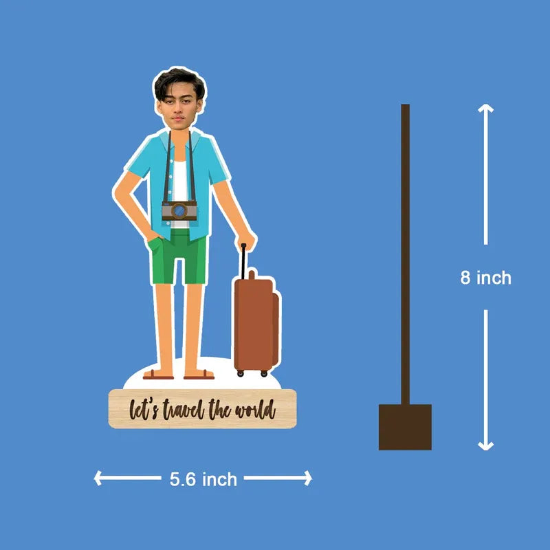 Illustration of a person with a suitcase and camera, standing on a base with 'let's travel the world' text, against a blue background.
