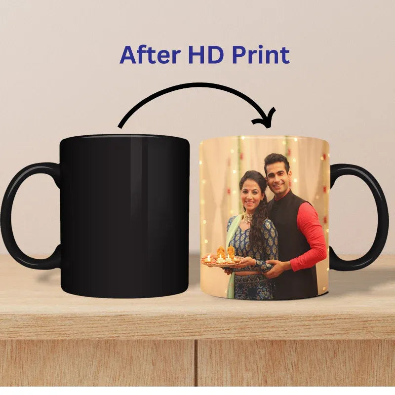 Black mug with a printed design of a couple on a wooden surface, labeled 'After HD Print'.