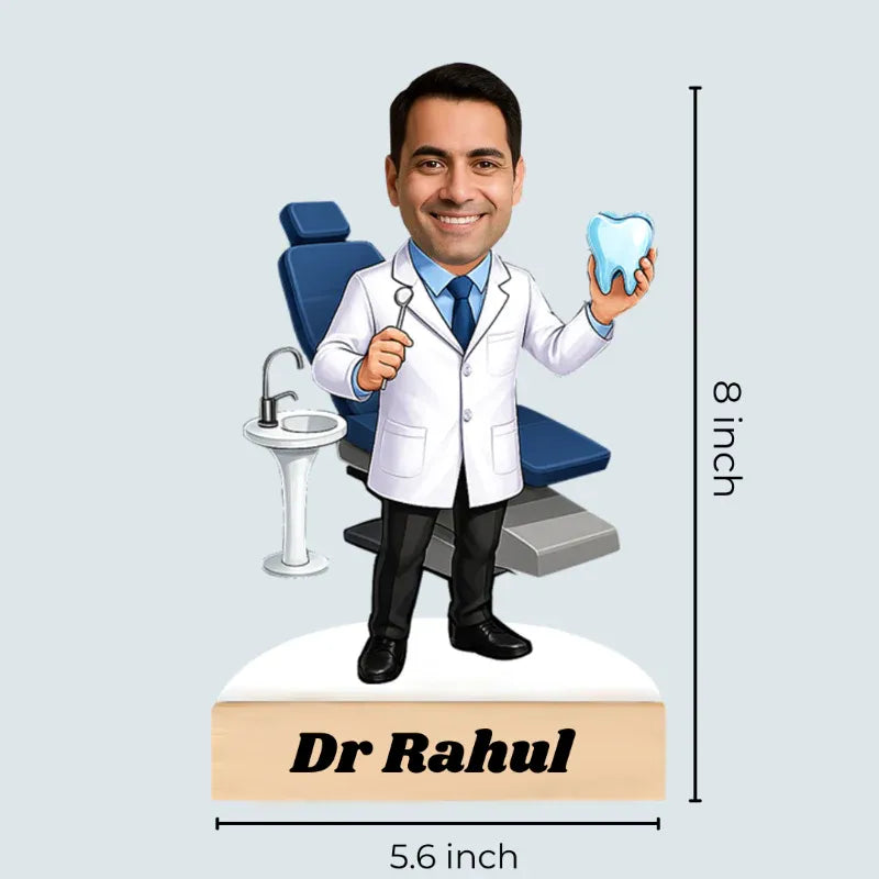 Bobblehead figure of a dentist named Dr. Rahul with dental tools and a tooth, displayed on a light gray background.