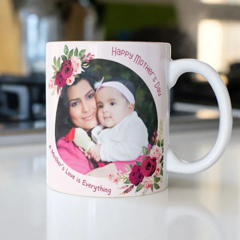 Mug with a photo of a woman and child, floral design, and 'Happy Mother's Day' text.