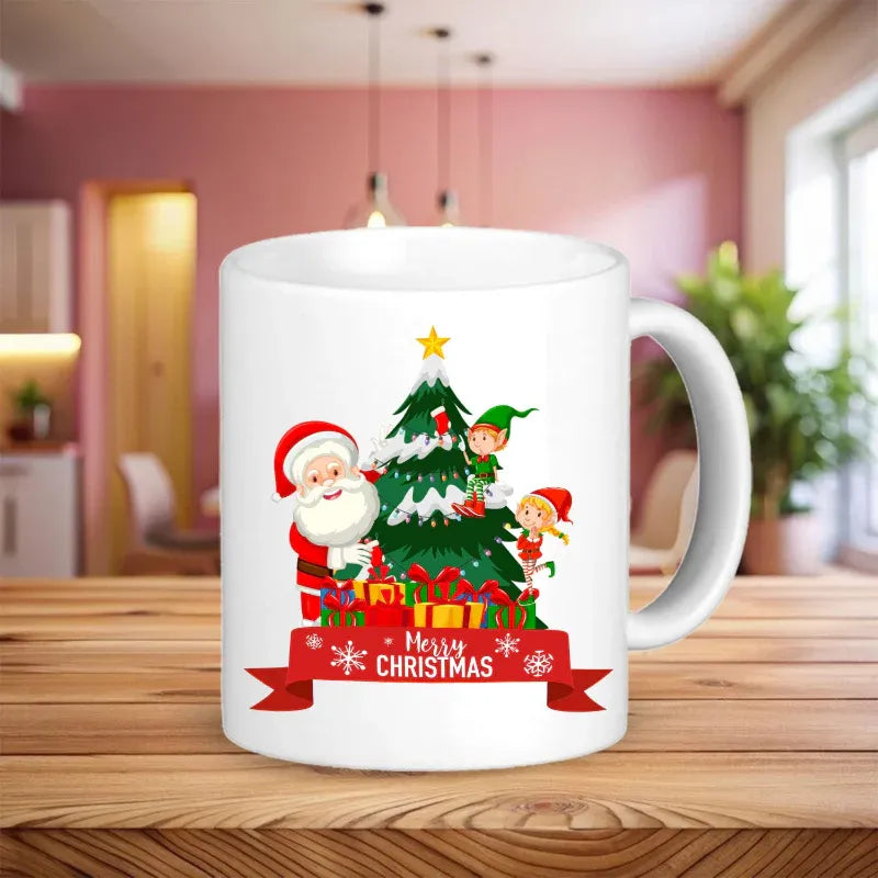 White mug with Christmas design featuring Santa Claus, elves, and a tree on a wooden table.