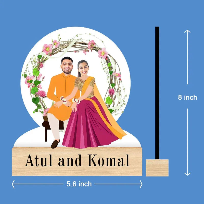 Decorative plaque with a couple's photo, floral design, and dimensions on a blue background