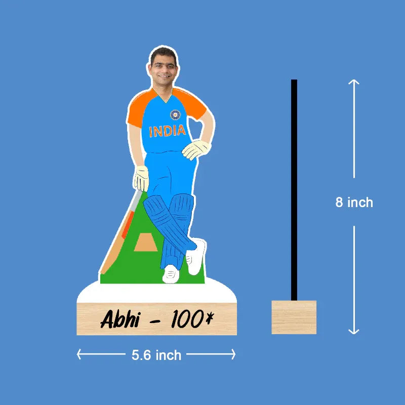 Cricketer figurine with measurements on a blue background
