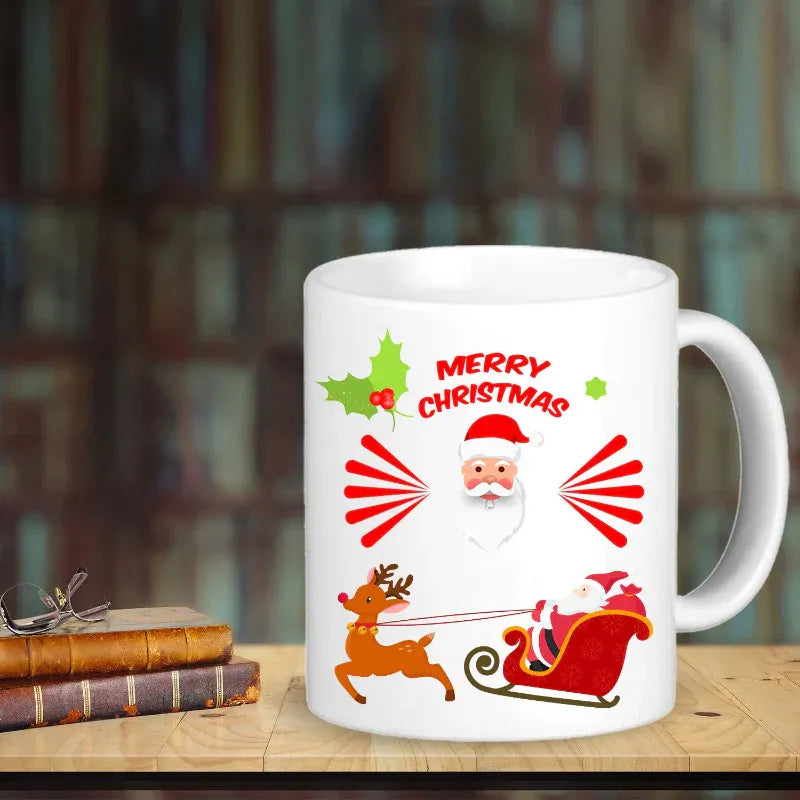 White mug with Christmas design featuring Santa Claus, reindeer, and holly on a wooden surface.