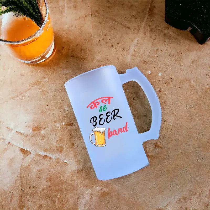 Frosted mug with 'Beer band' text on a textured surface