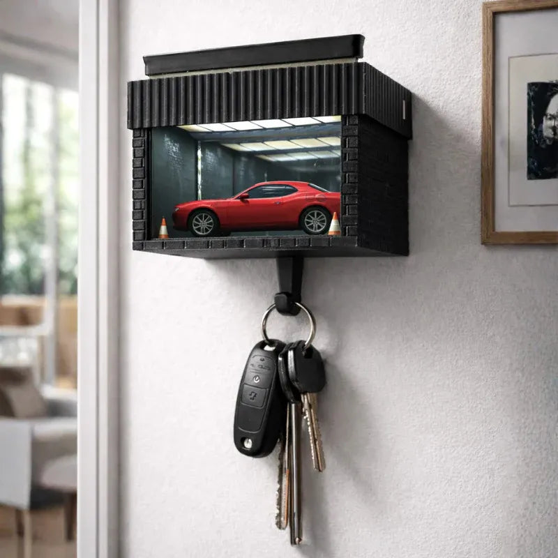 Key holder with mirror displaying a red car, mounted on a wall.