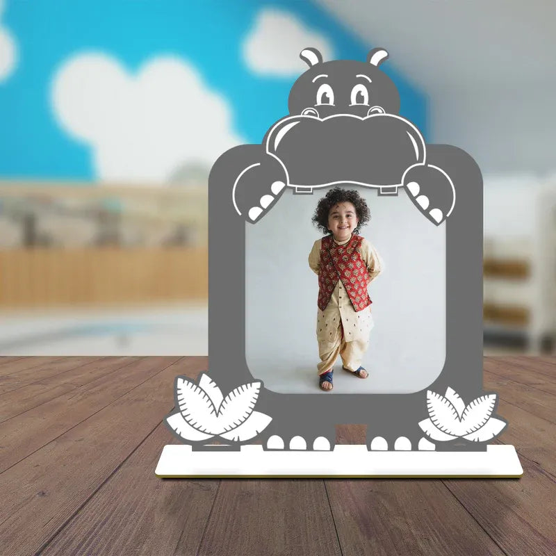 Children's photo frame with a cartoon character on a wooden floor