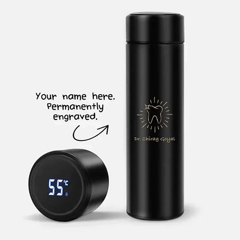 Black personalised  thermos bottle with digital temperature display and engraved name on a white background