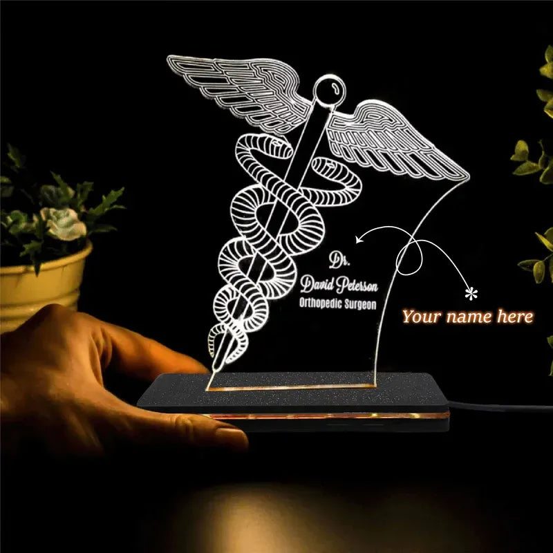 Lighted medical symbol with customizable text on a dark background